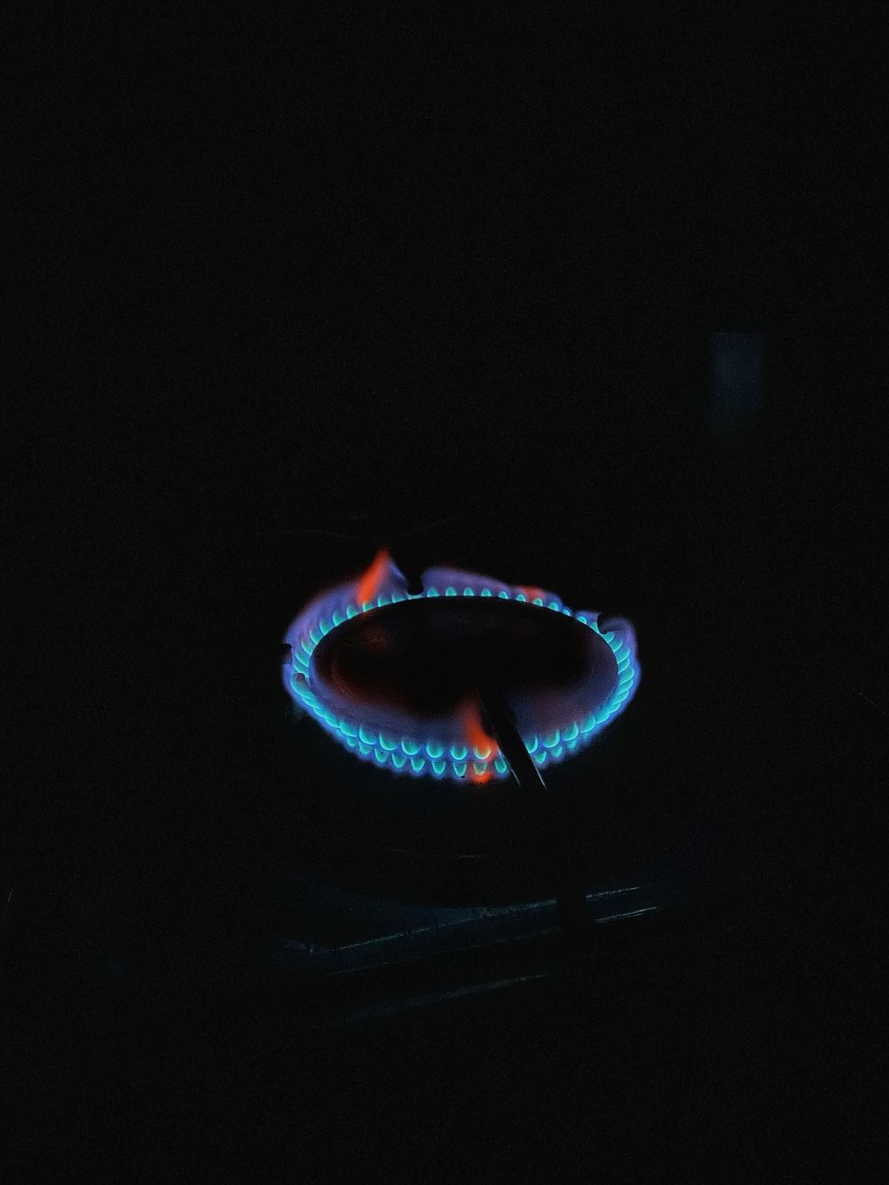 Blue flame ring on a gas burner